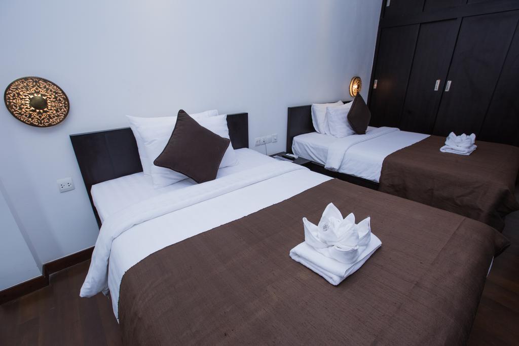 The Palm Boutique Hotel & Residence Phnom Penh Exterior photo
